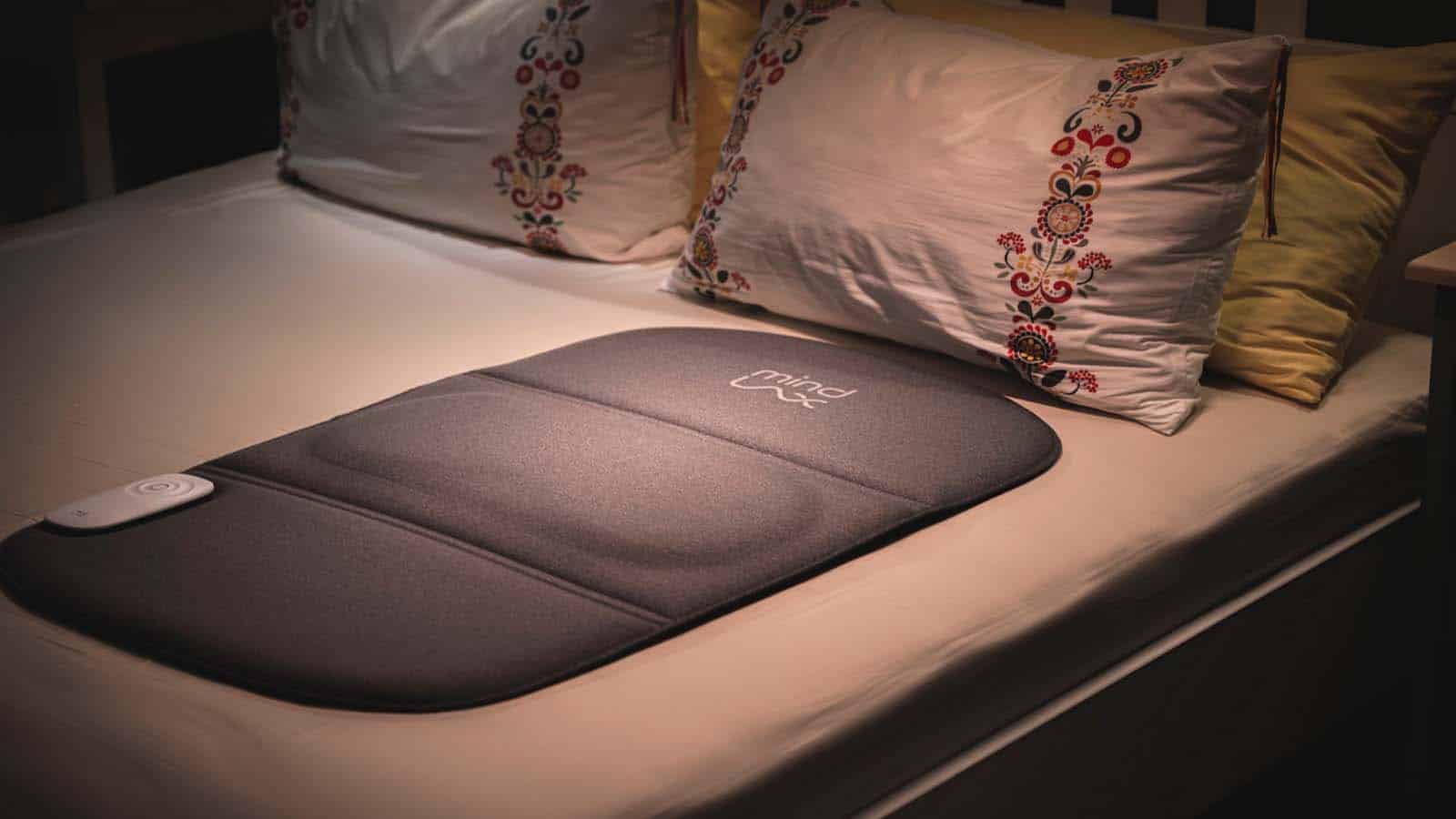 MindLax sleeping mat on bed