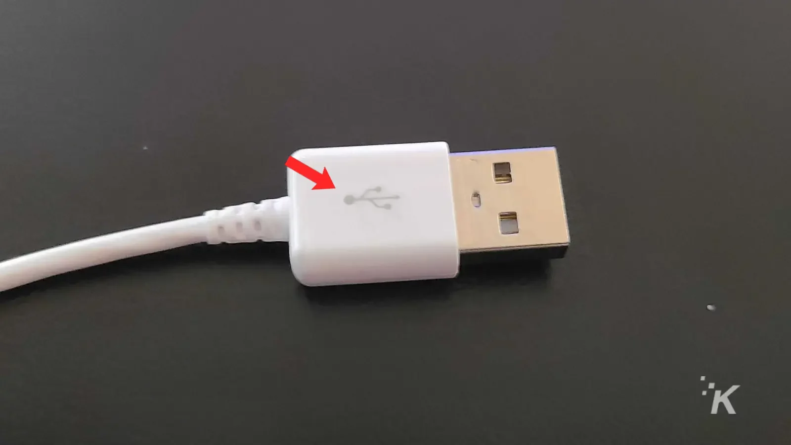 usb cable with usb logo on top