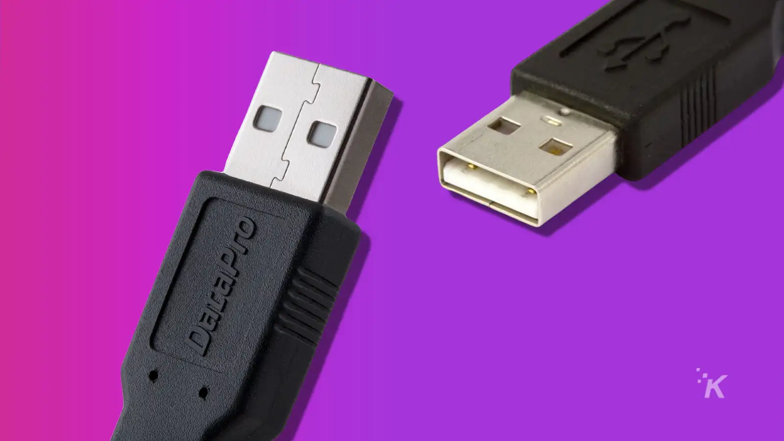 two usb plugs on a purple background