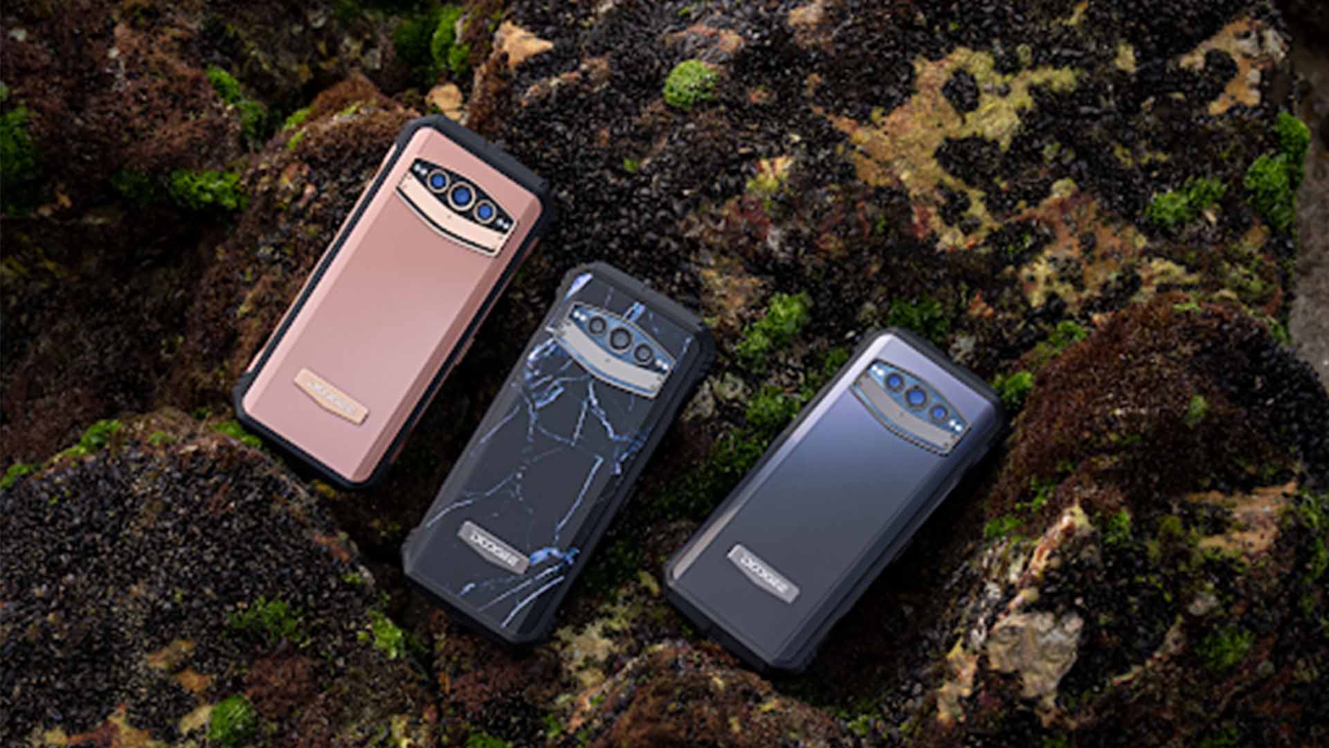 A couple of cell phones on a rock.