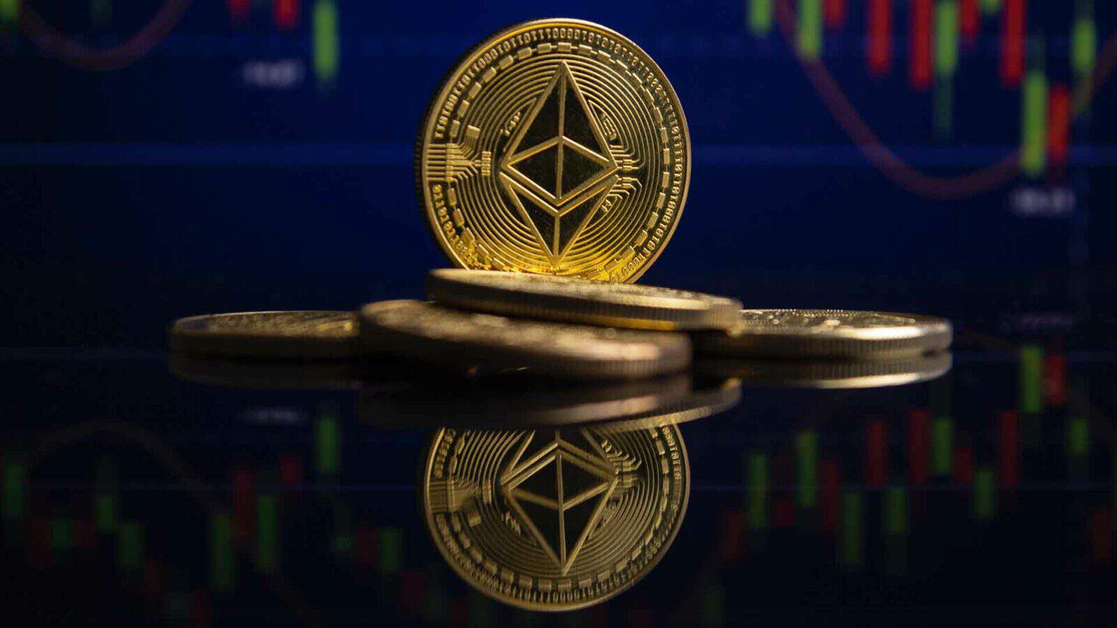 Ethereum coins in front of charts