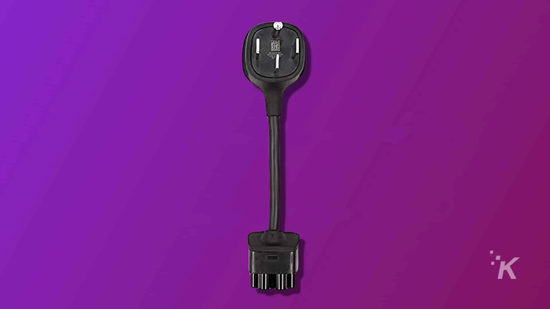 a tesla nema 14-50 adapter on a purple background