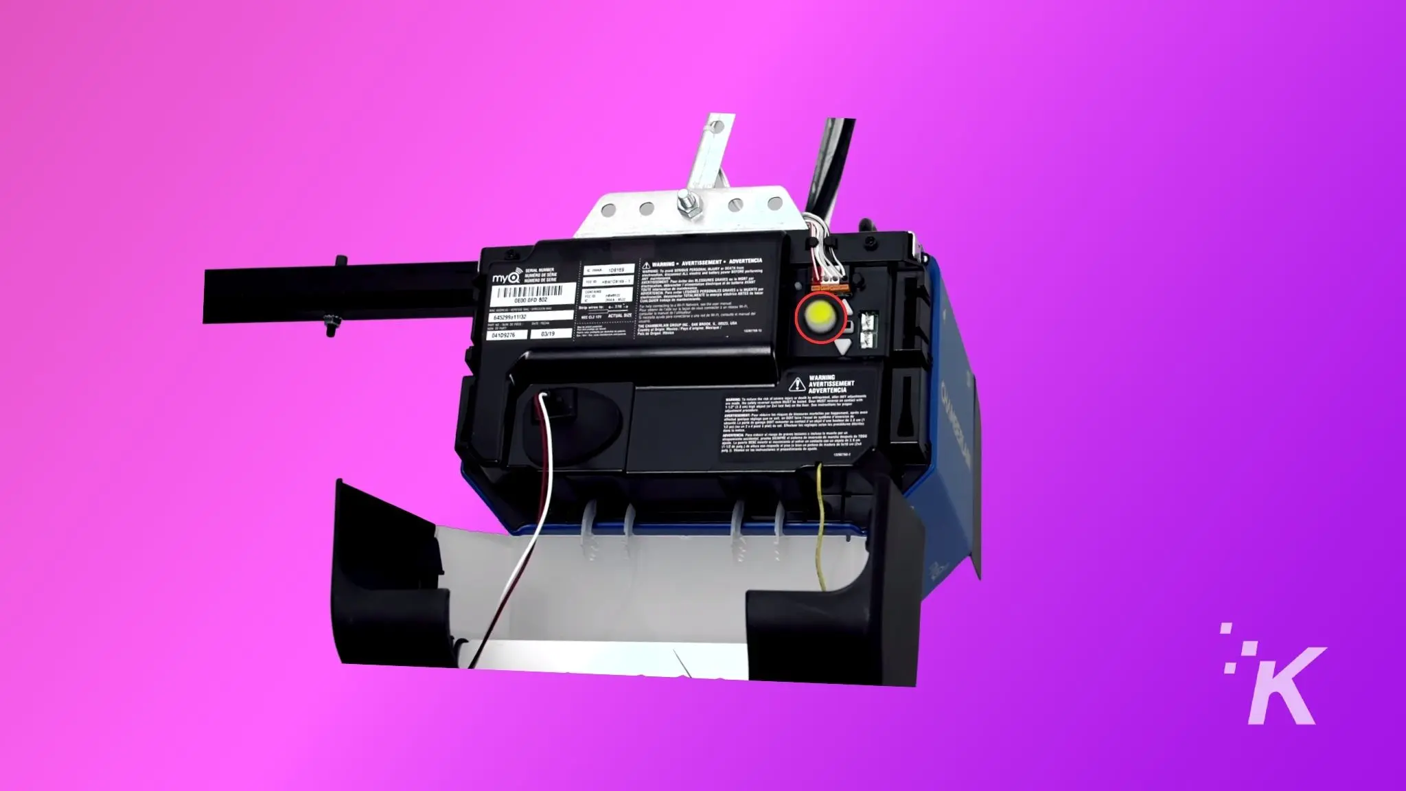 Image of a chamberlain garage door opener showing the learn button