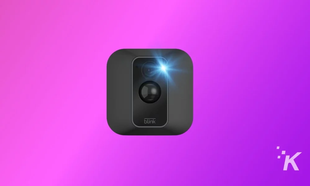 The image showing blink camera on the purple background