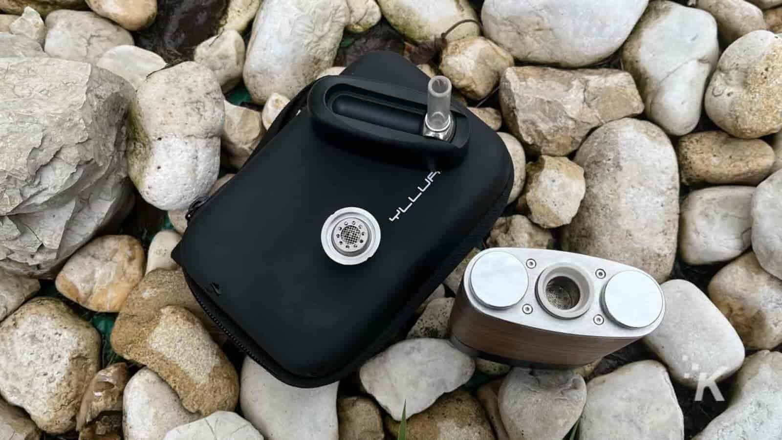 Angus Halogen Vaporizer by YLLVAPE outdoors by rocks