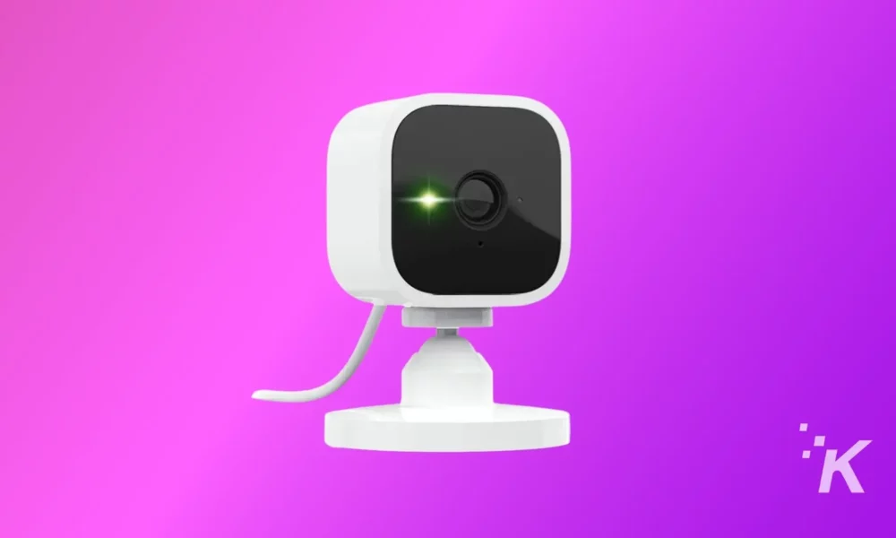 Blink mini camera flashing green light on the purple background
