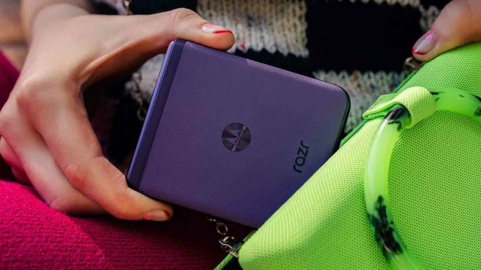 A person holds a cell phone.