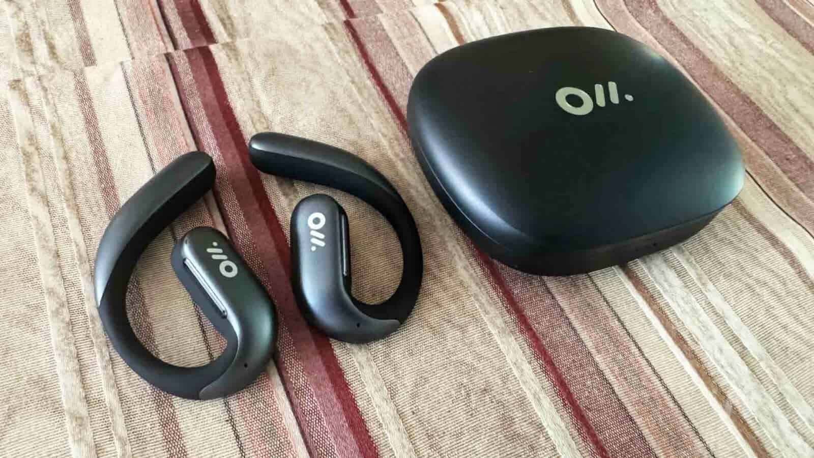 Oladance OWS Pro headphones and charging case