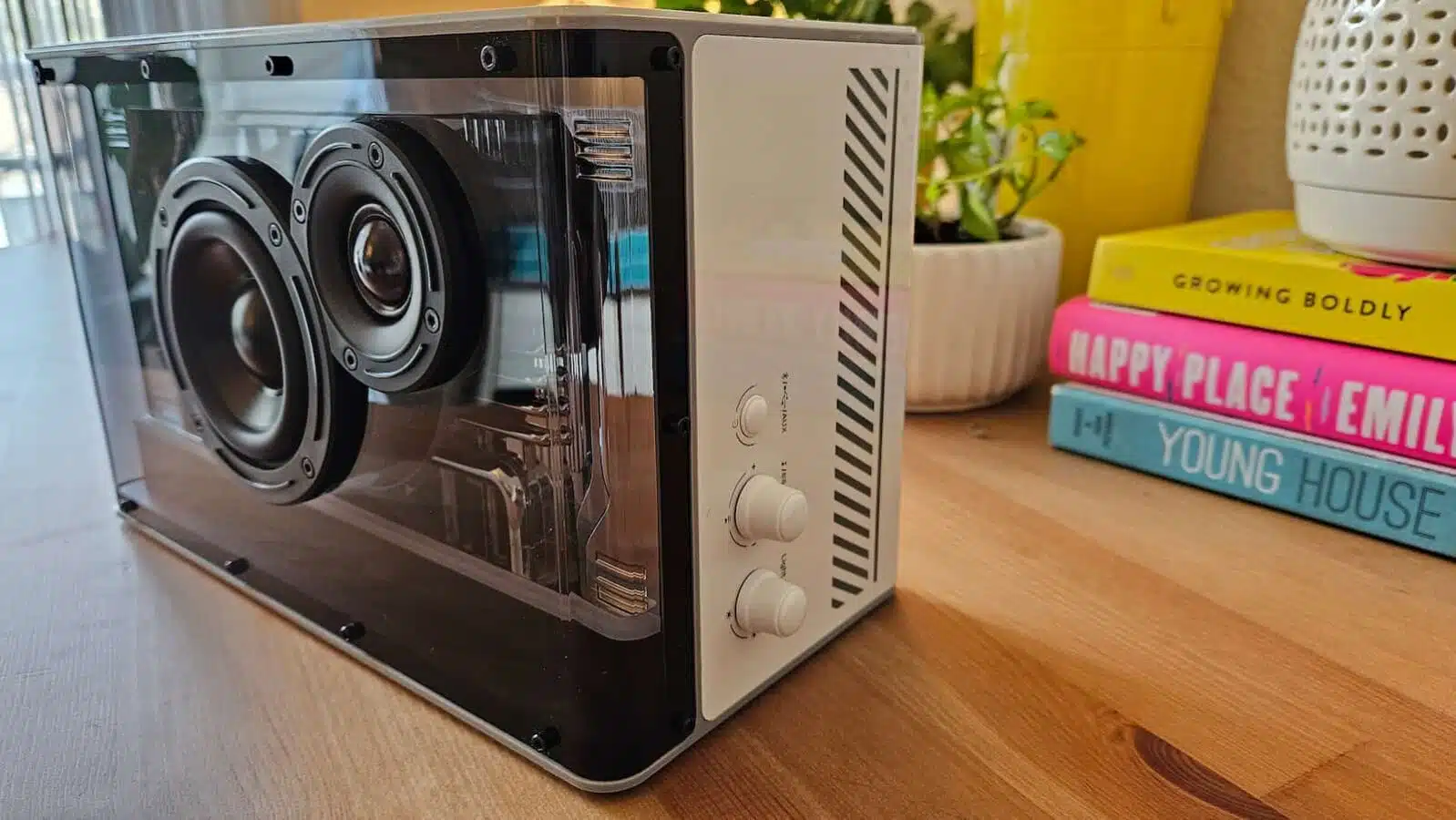 The right side of the Edifier QD35 on a wooden table.