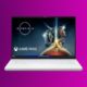 A white laptop on a purple background displaying wallpaper for the video game "starfield" with the xbox game pass logo in the corner.