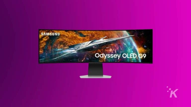 A Samsung Odyssey OLED G9 gaming monitor displaying a spaceship and cosmic imagery, placed against a purple background.