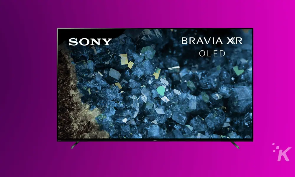 Sony Bravia XR OLED TV showcasing a close-up of a textured, crystal-like blue and black surface. High-quality image emphasizing TV display technology with vivid colors and sharp detail.