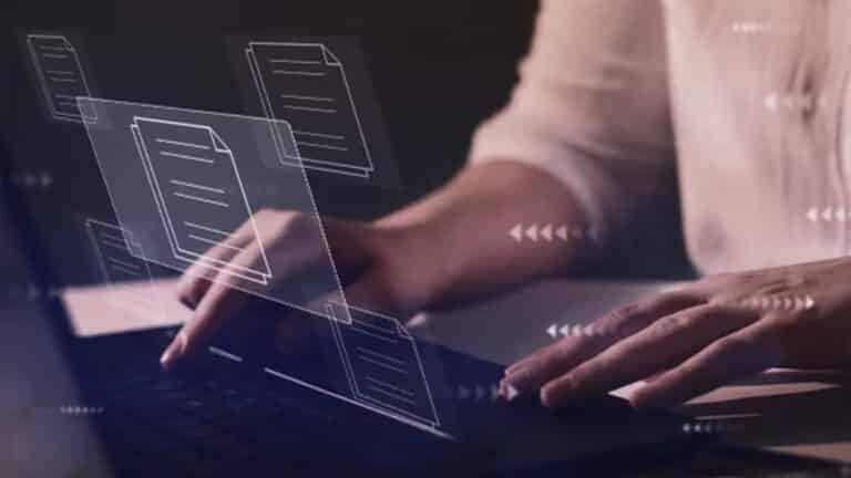 person on computer collecting data.