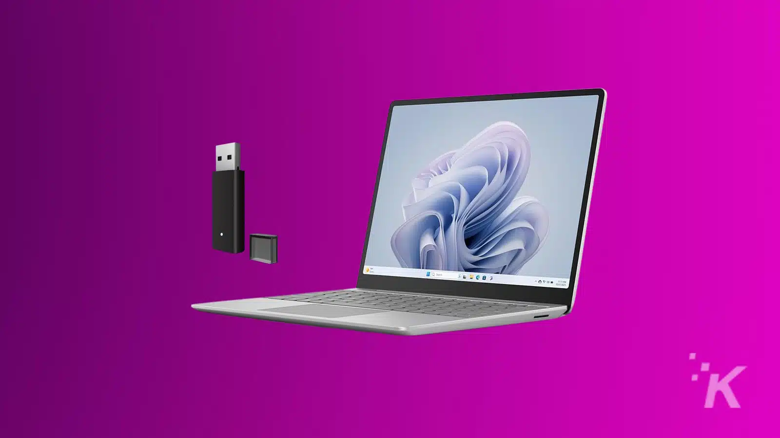 microsoft surface laptop next to xbox wireless adapter