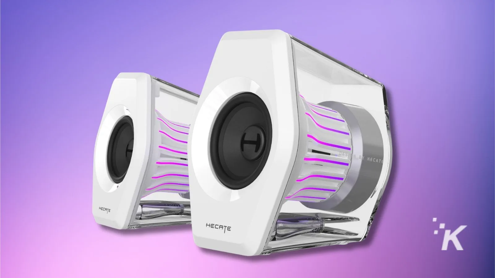 High-tech gaming speakers with futuristic design featuring purple LED accents on a vibrant purple background.