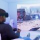 Man playing virtual reality shooter game.