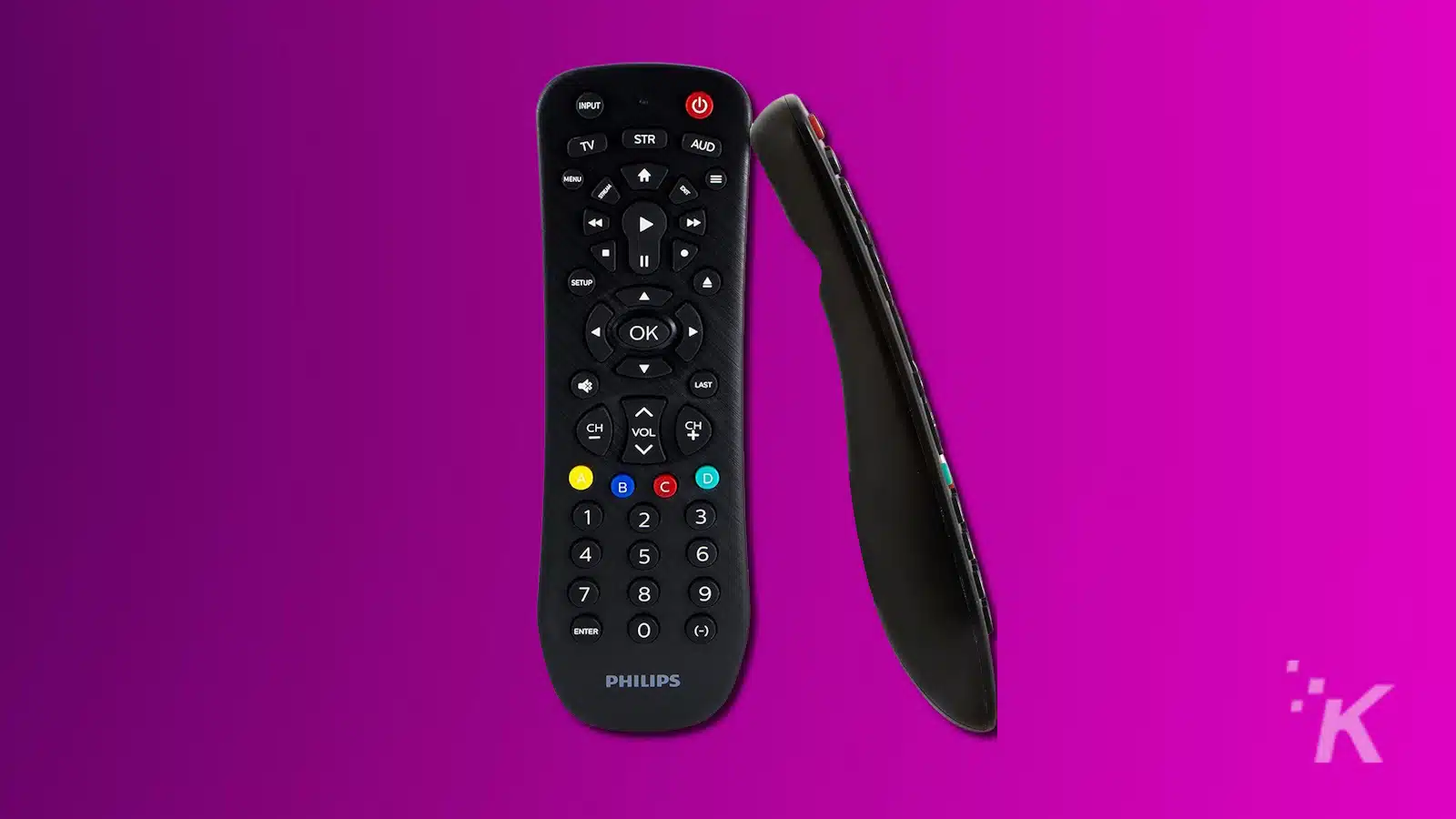 Philips black remote control on purple background.