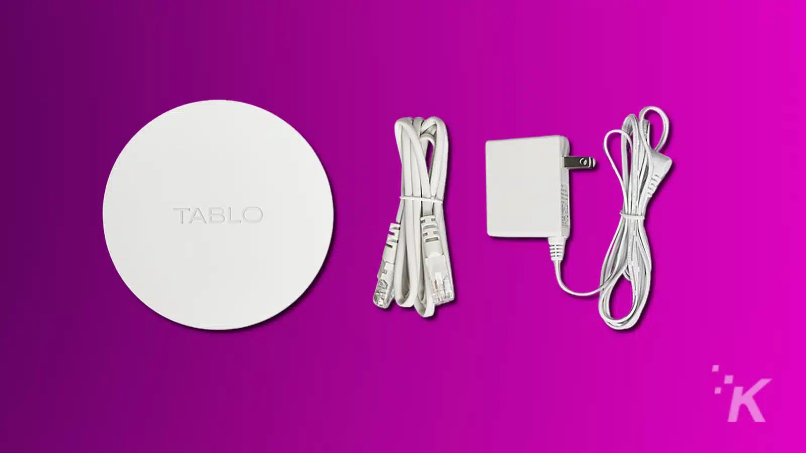 Tablo device with power and ethernet cables on purple.