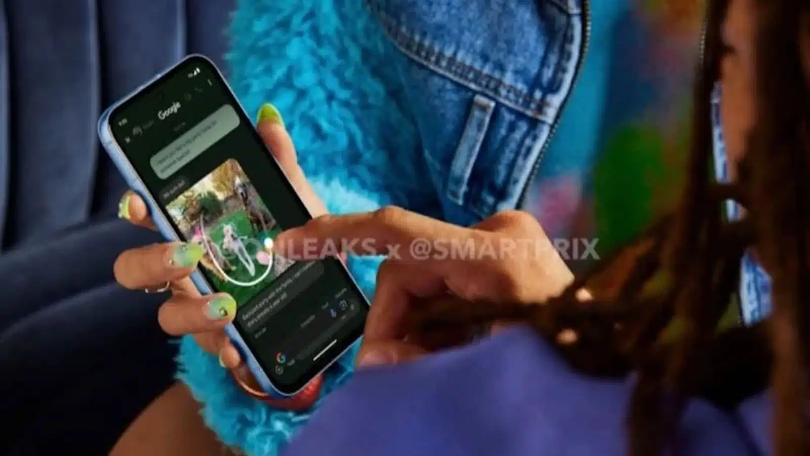 Person browsing Google on smartphone with colorful nails.