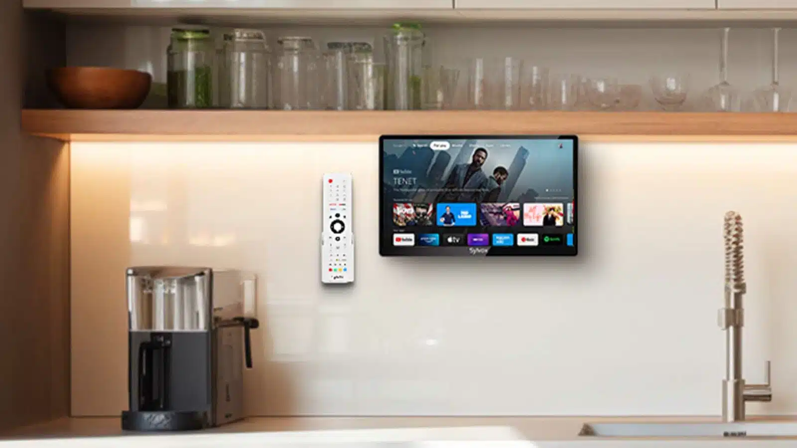 Sylvox Smart TV and remote in modern kitchen setting.