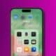 Apple smartphone with apps on screen.
