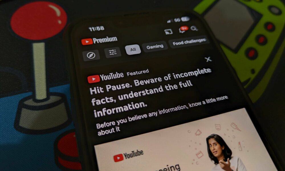 YouTube caution message on smartphone screen