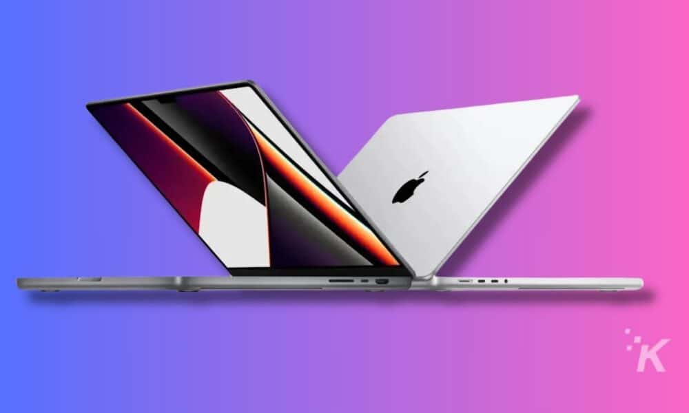 Dual laptops on pink-blue gradient background.