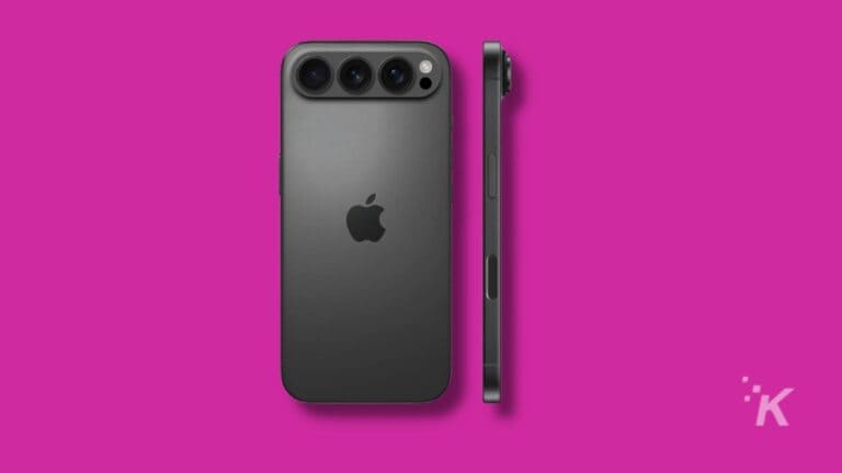 Black iPhone on pink background