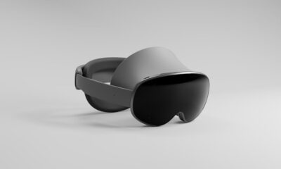 Gray virtual reality headset on white background
