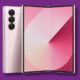 Foldable smartphone with triple camera, purple background