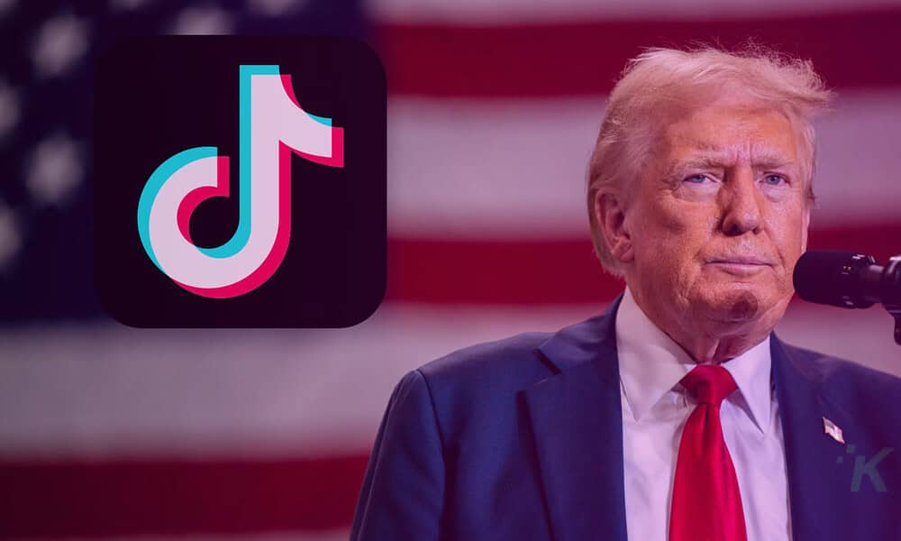 Man speaking at event with TikTok logo.