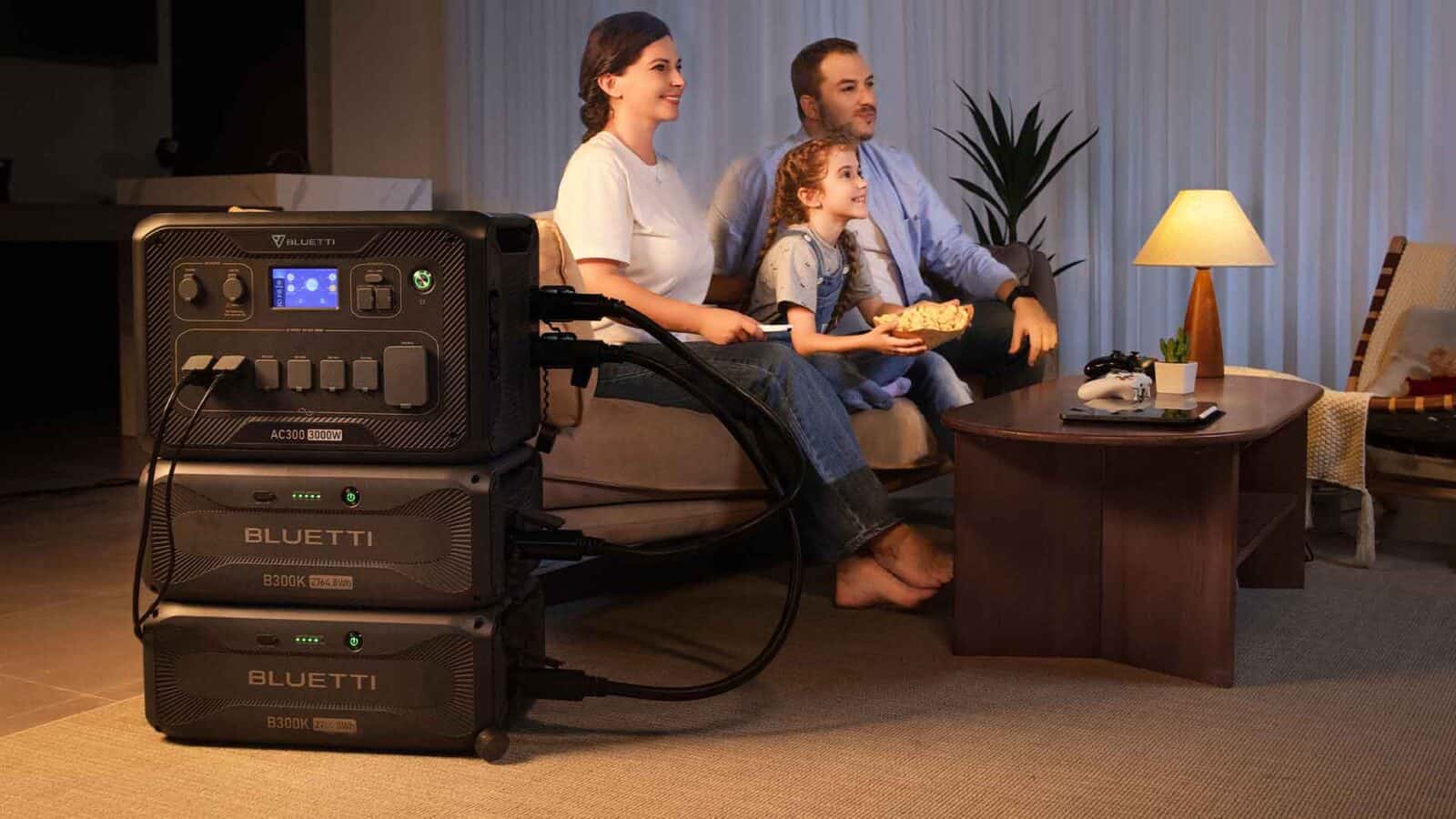 Family watching TV using Bluetti power station