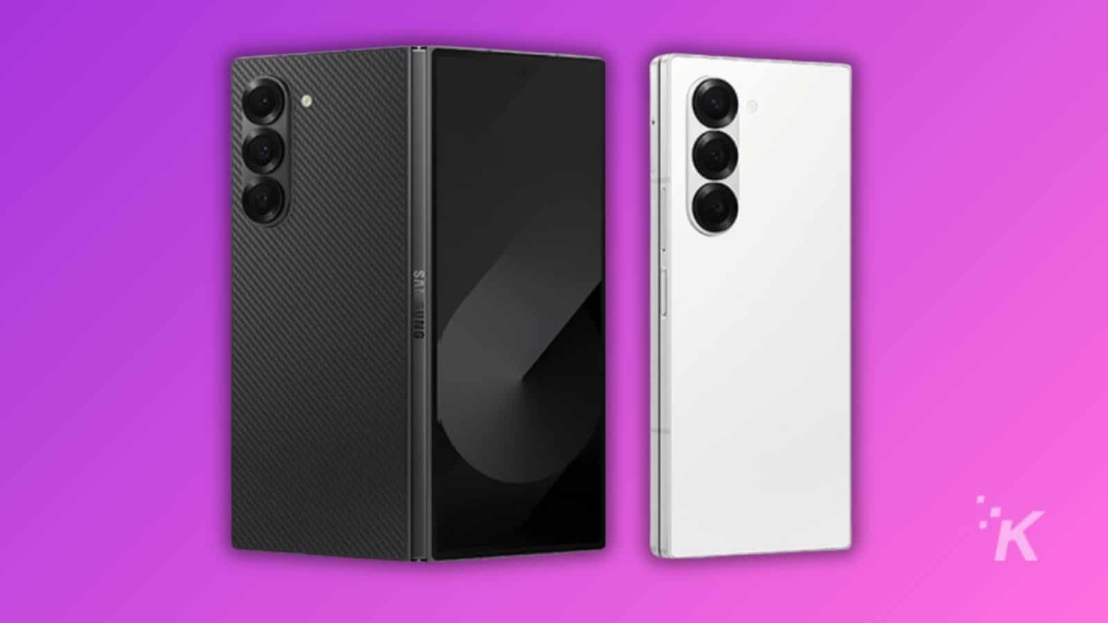 Black and white smartphones on purple background