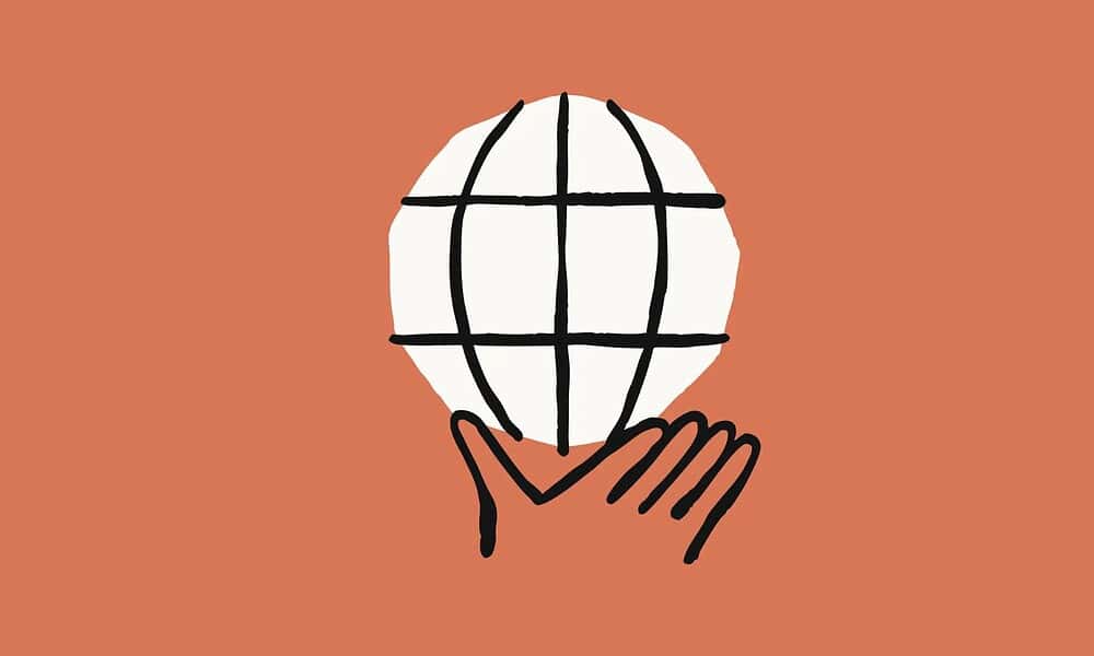 Illustration of hand holding a globe on orange.