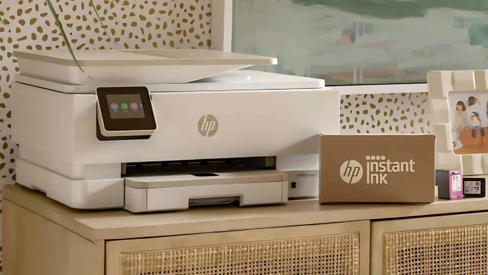 HP printer with Instant Ink box on cabinet