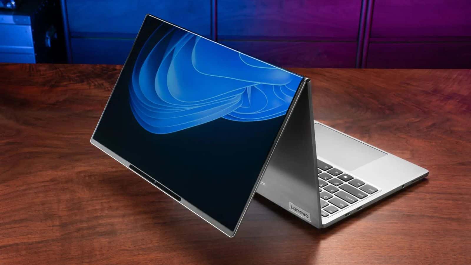 Lenovo laptop in tent mode on desk.