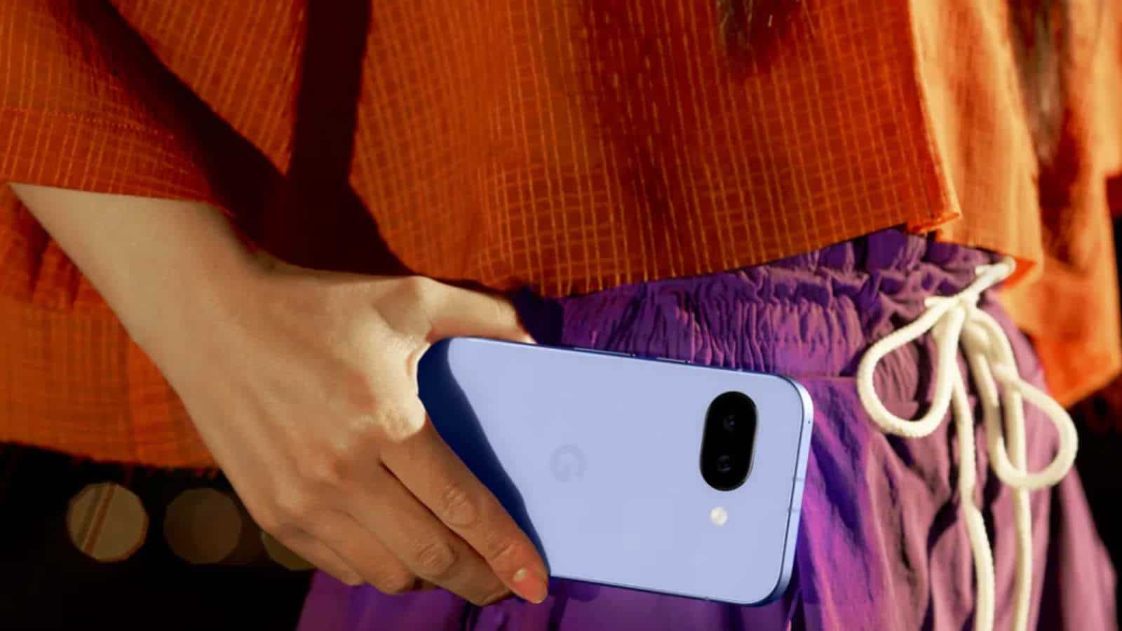 Person holding a light purple smartphone