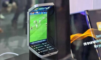 Foldable phone displaying a soccer match