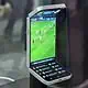 Foldable phone displaying a soccer match