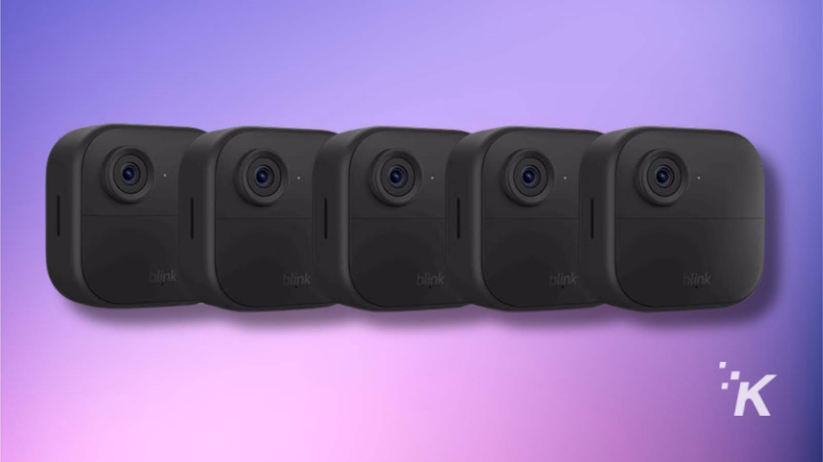 Five black security cameras on purple background.