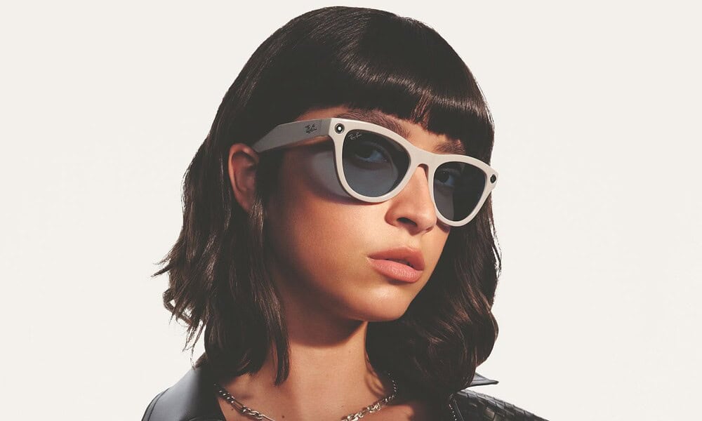 Person wearing stylish sunglasses indoors.