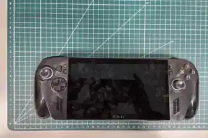 Handheld gaming console on cutting mat