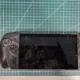 Handheld gaming console on cutting mat