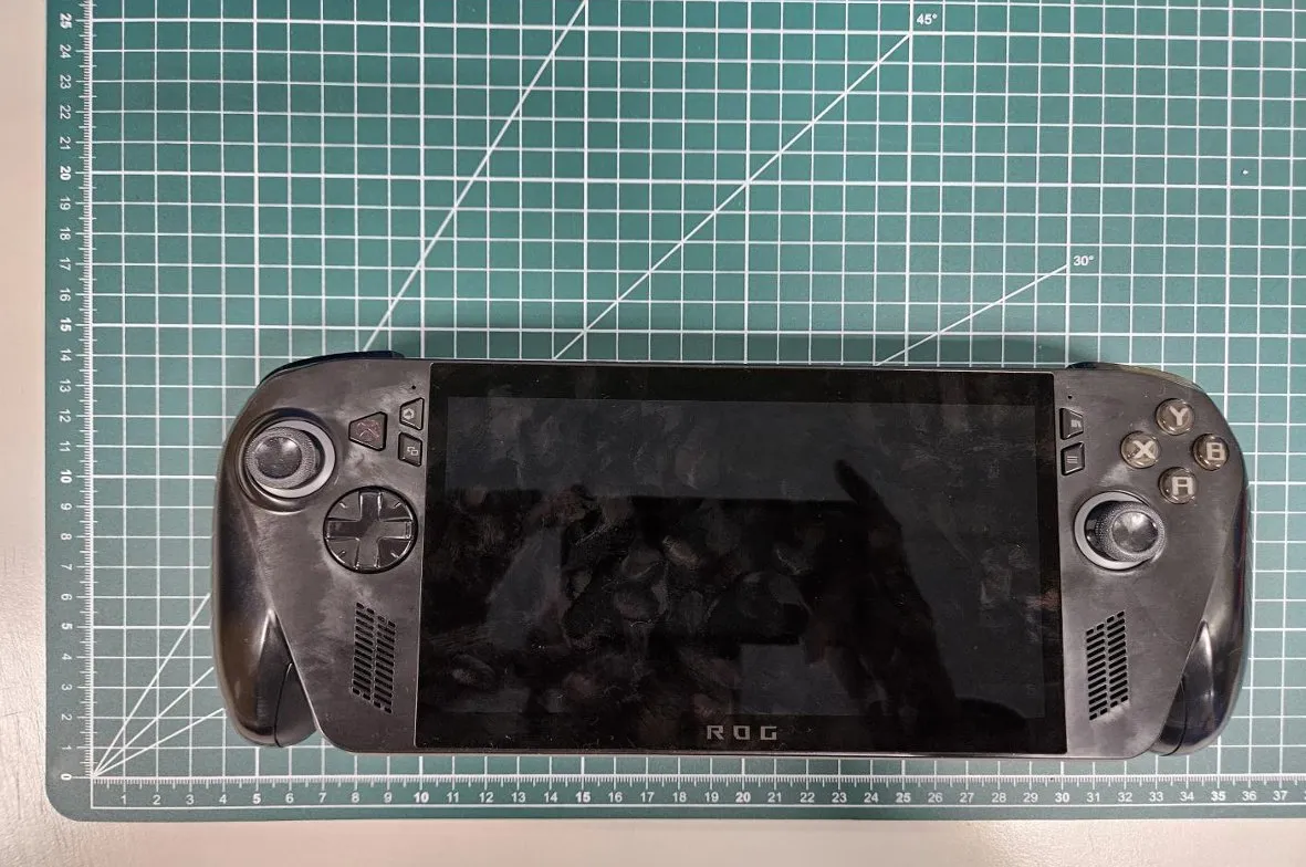 Handheld gaming console on cutting mat