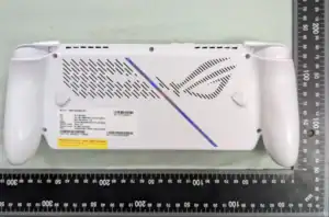 White gaming console back with measurement rulers.