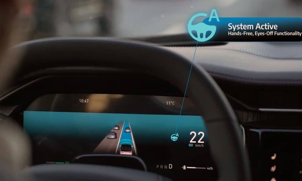 Car dashboard showing active hands-free driving.