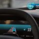 Car dashboard showing active hands-free driving.