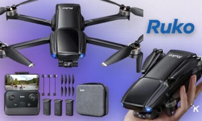 Ruko drone with accessories, remote, and carrying case.