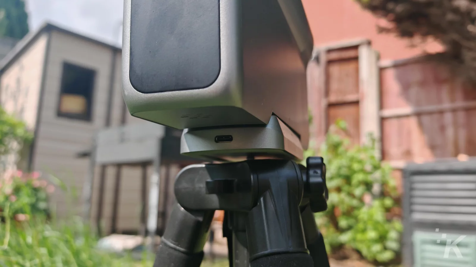 Camera mounted on tripod outdoors
