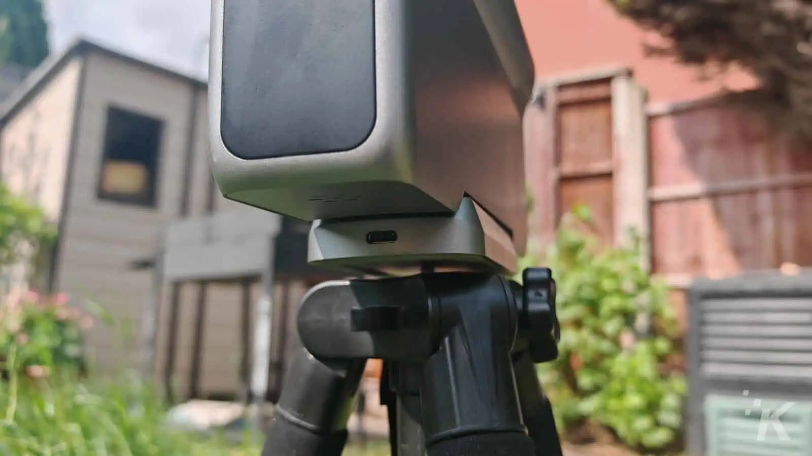 Camera mounted on tripod outdoors